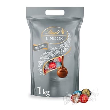 Lindt Schokolade | LINDOR Beutel Silber Mischung | 1 kg Beutel | 80 Kugeln mit zartschmelzender Füllung in den Sorten Milch, 70%, Salted Caramel, Double Chocolate | Schokoladen-Geschenk zum Teilen